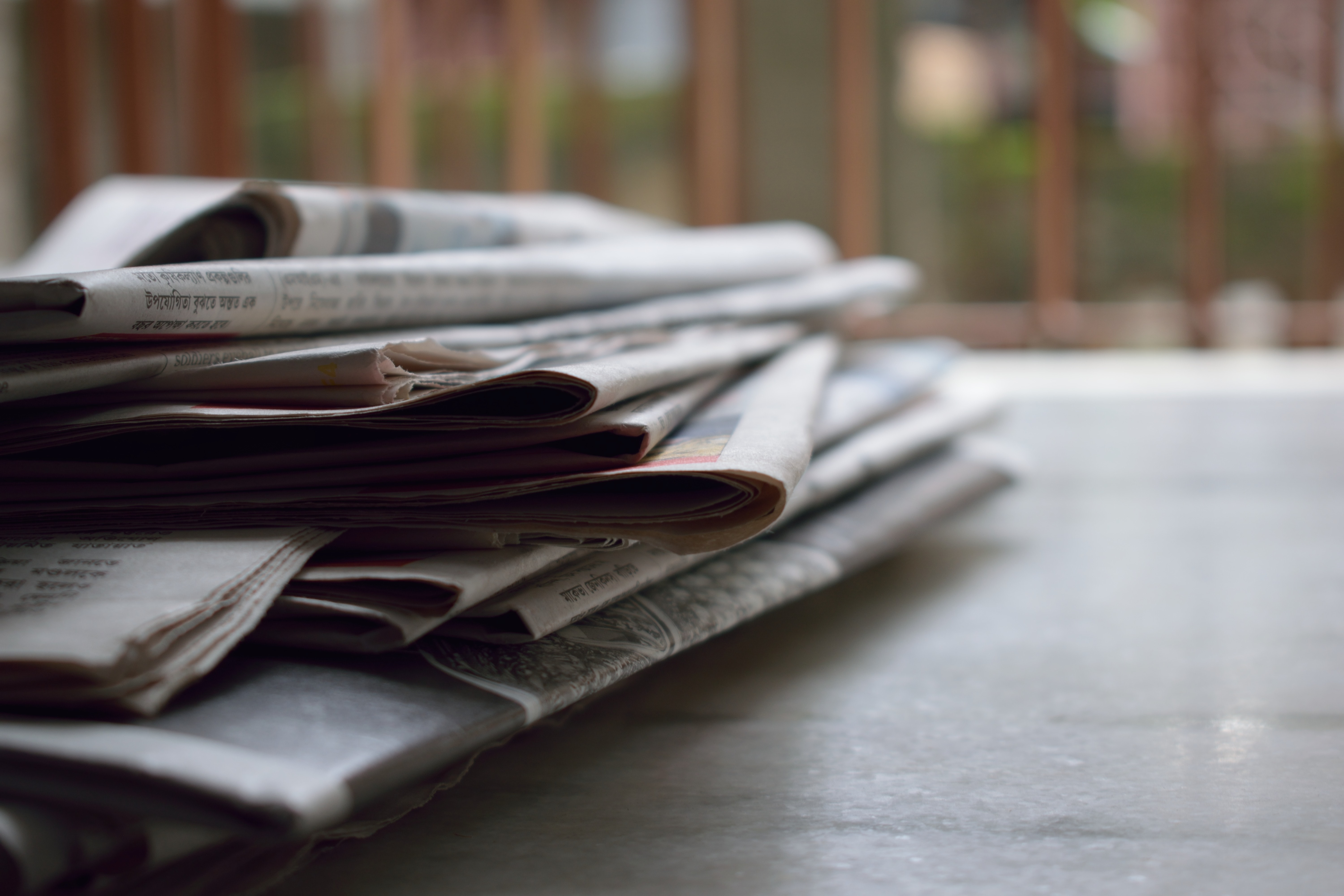 Press Newspapers on a table